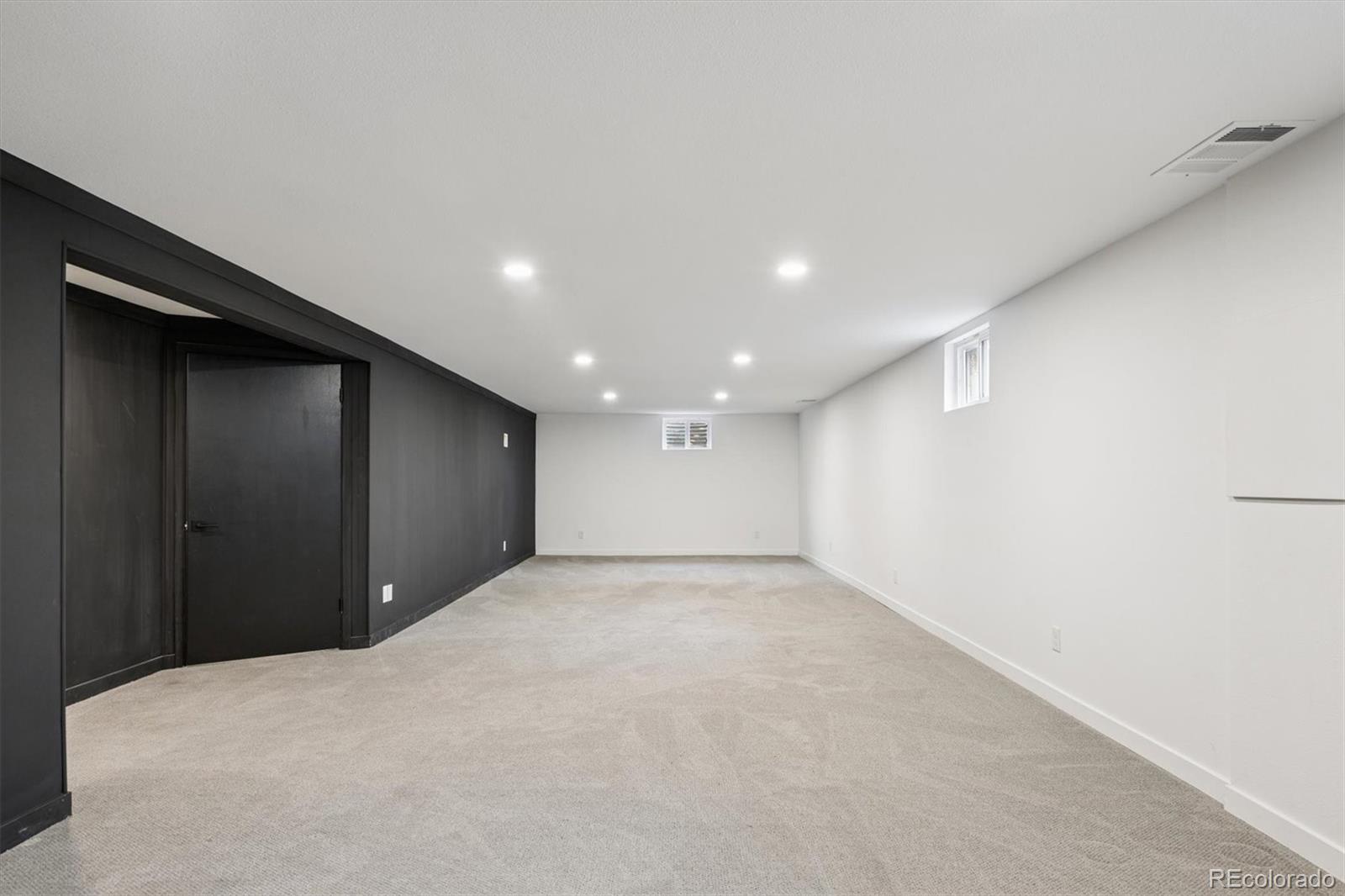 8257 Yarrow Court Arvada, CO 80005 - Photo 9 of 38 a view of an empty room