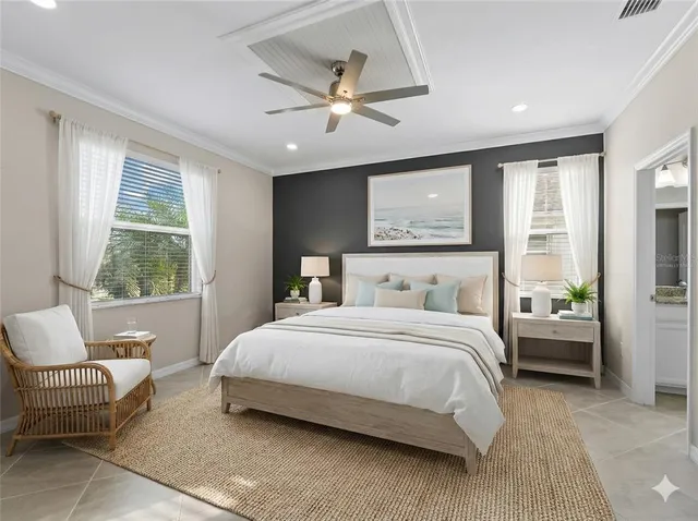 a view of a livingroom with a flat furniture and a ceiling fan