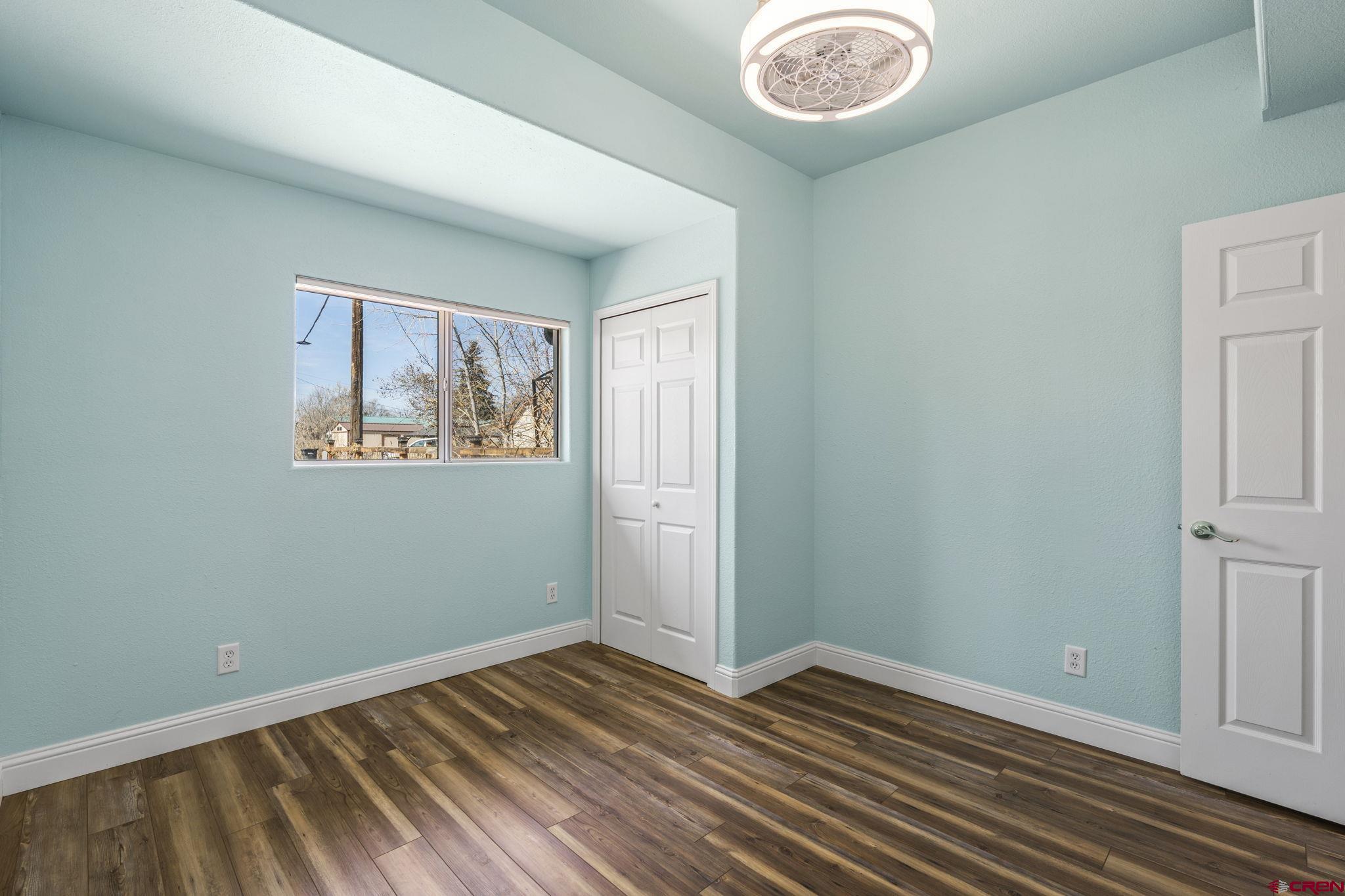 486 South Church Street Bayfield, CO 81122 - Photo 15 of 32 a view of room with window and wooden floor