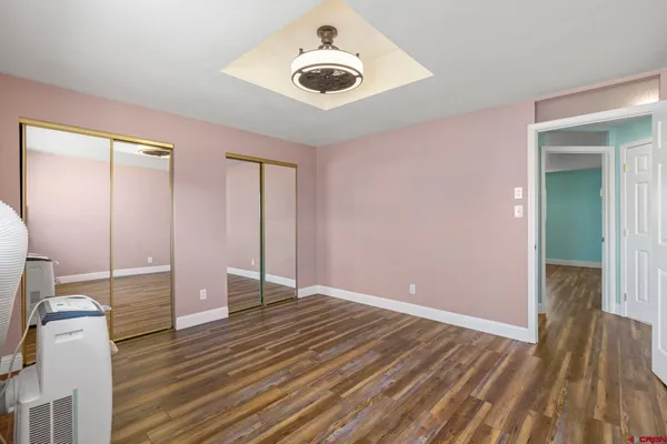 wooden floor and windows in a room