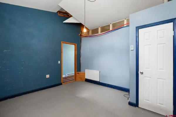 an empty room and entryway