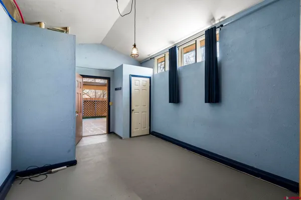 a view of a room with stairs