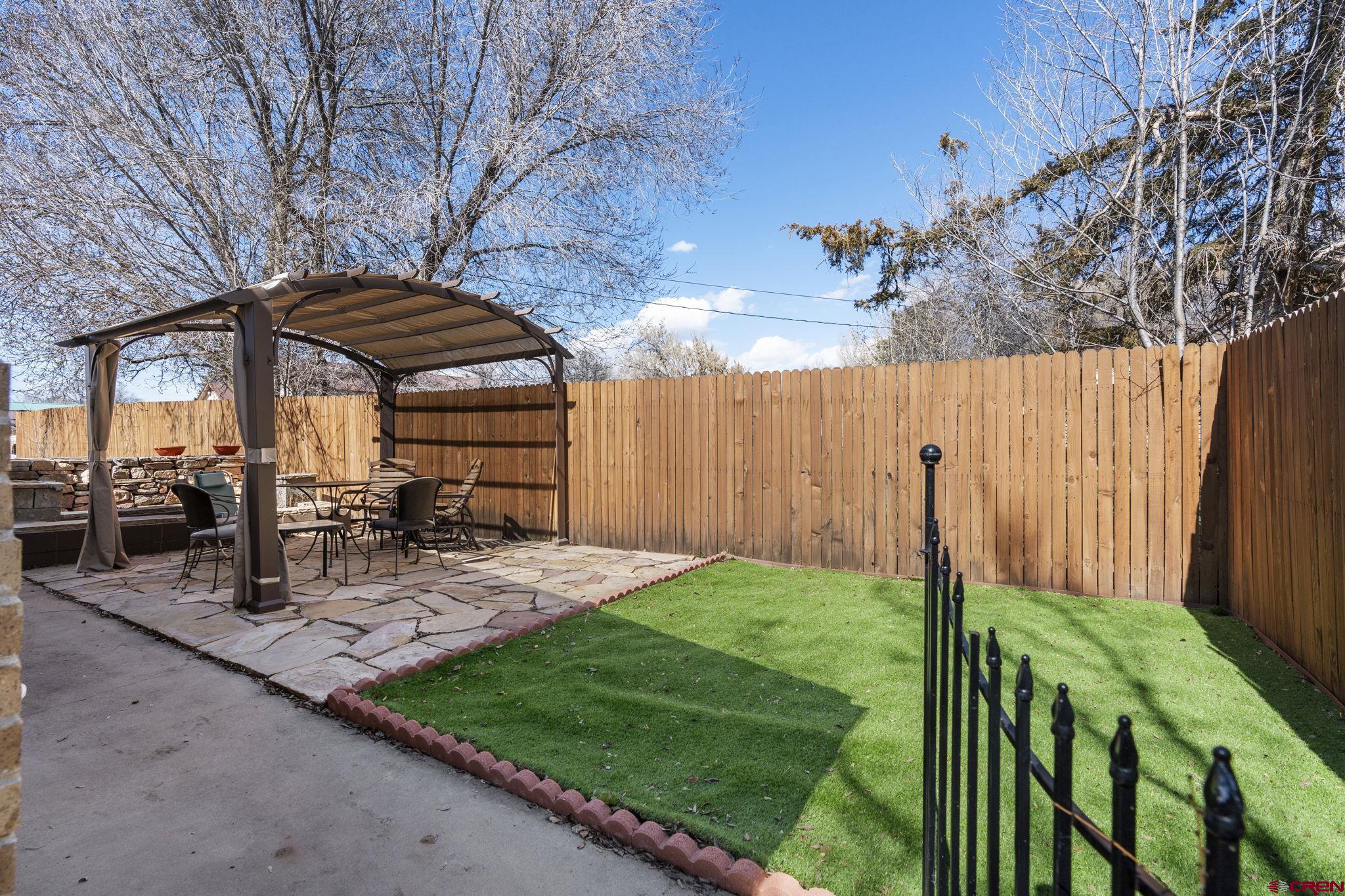 486 South Church Street Bayfield, CO 81122 - Photo 27 of 32 a view of a backyard with a patio