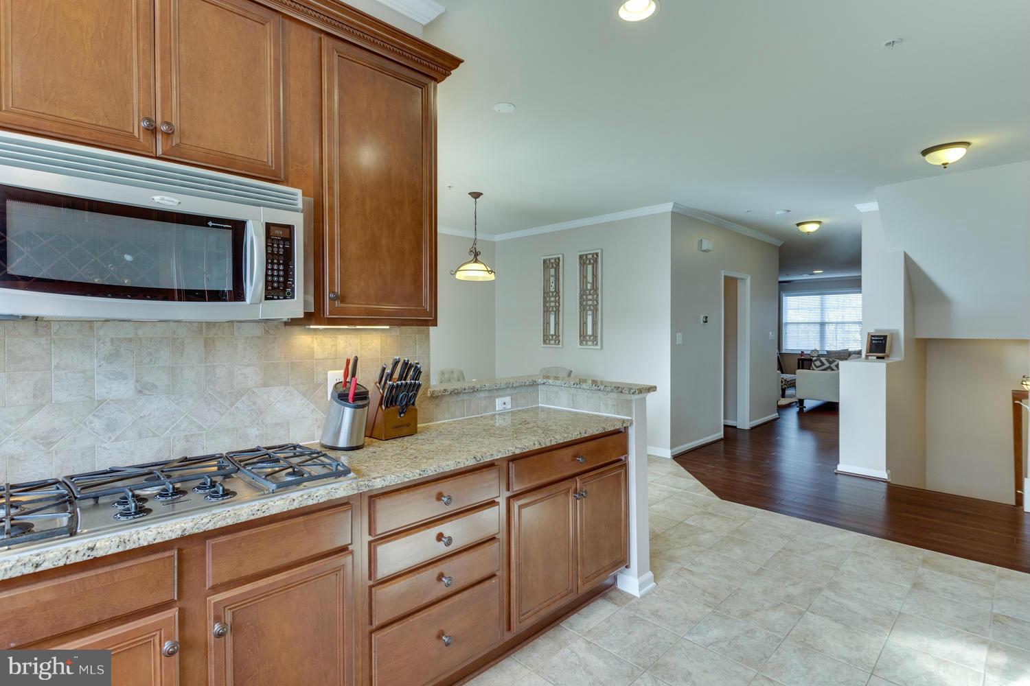 12430 Liberty Bridge Road, Unit B Fairfax, VA 22033 - Photo 13 of 30 Kitchen w/gas range, granite counters,