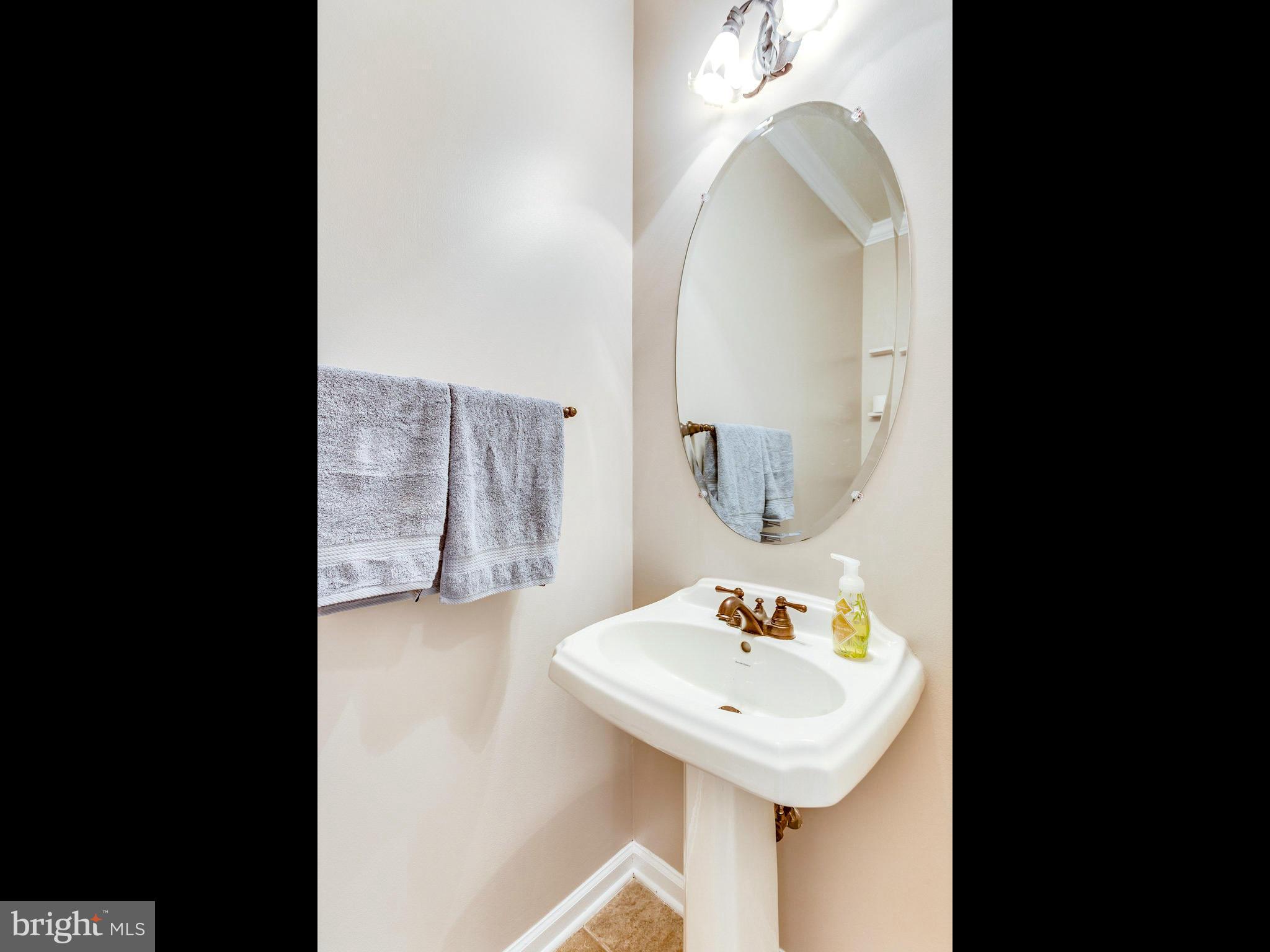 12430 Liberty Bridge Road, Unit B Fairfax, VA 22033 - Photo 9 of 30 Main level Half-Bath