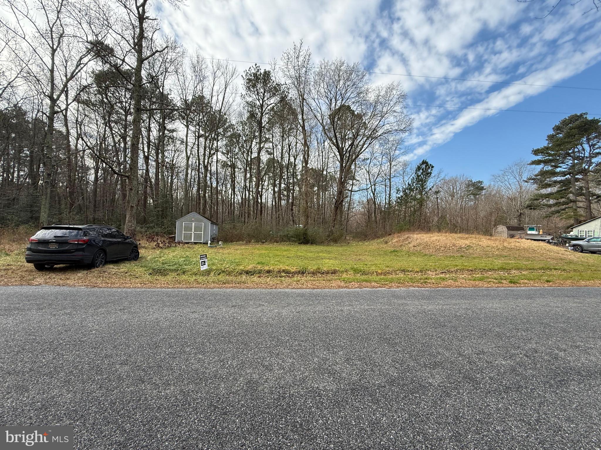 a swimming pool with wooden fence