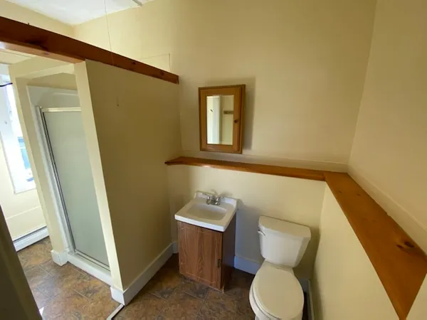 a bathroom with sink and toilet