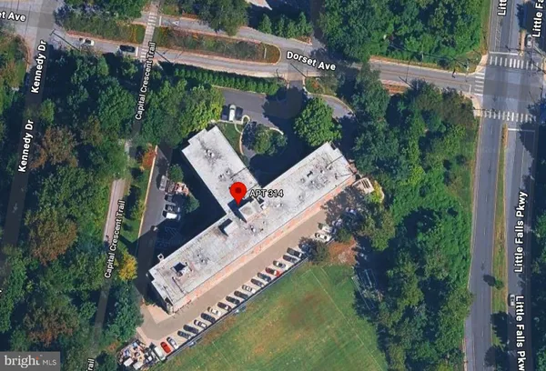 an aerial view of a house with outdoor space pool seating area and yard