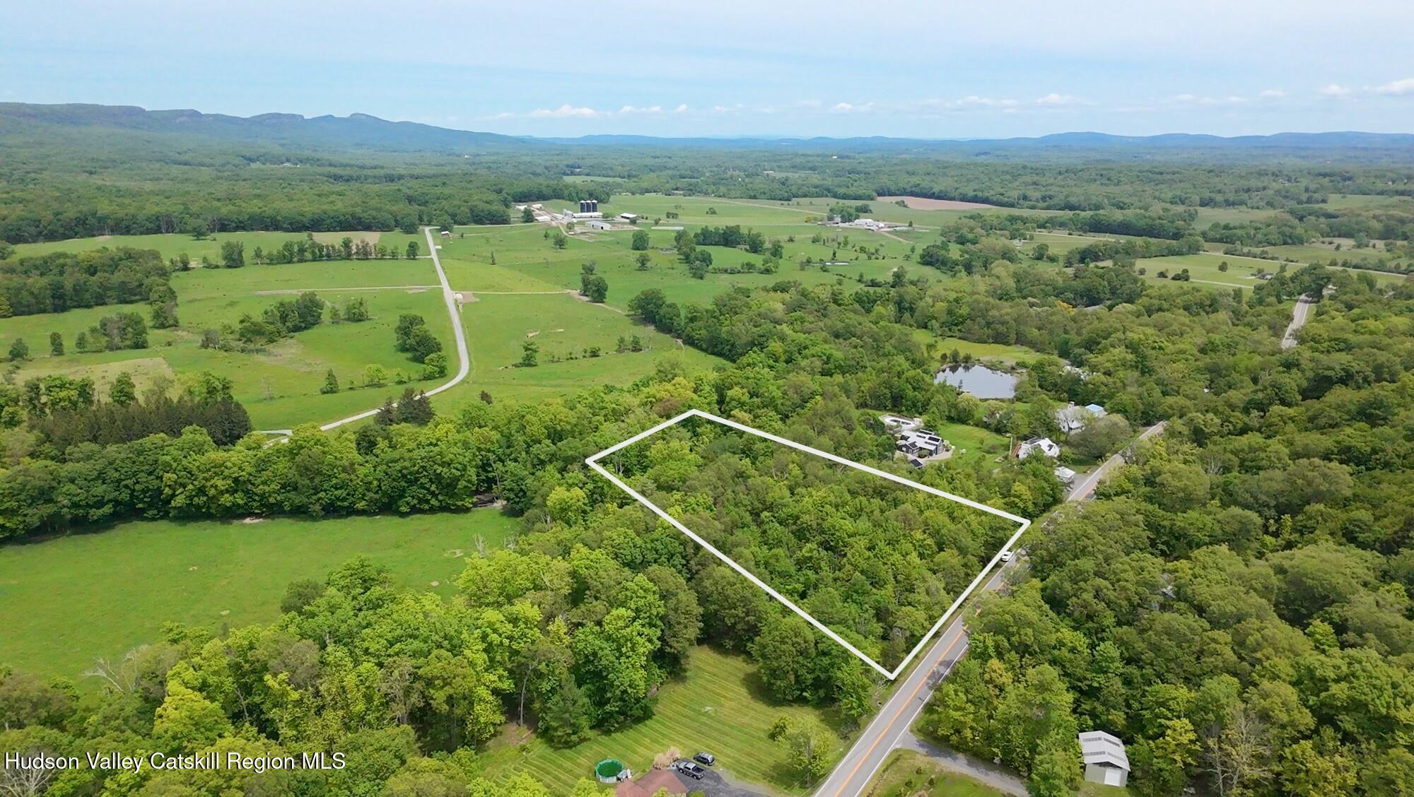 Tbd Tillson Lake Road Wallkill, NY 12589 - Photo 1 of 13 an aerial view of residential houses with outdoor space and trees