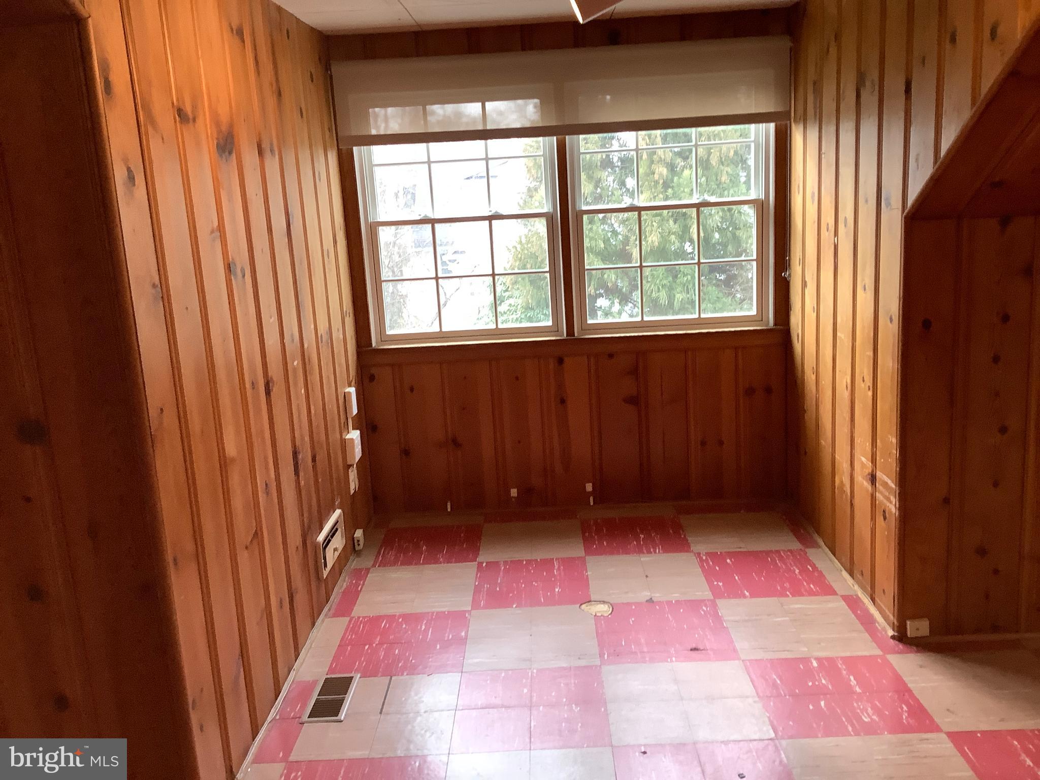 5702 Ogden Road Bethesda, MD 20816 - Photo 17 of 23 a bathroom with a vanity and a shower