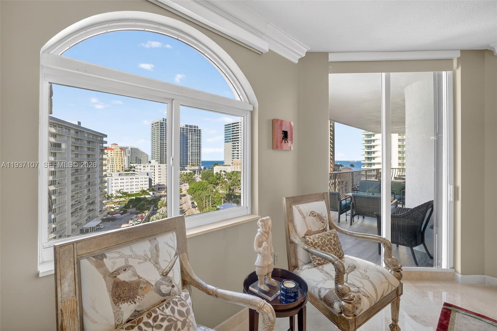 100 South Birch Road, Unit 1103F Fort Lauderdale, FL 33316 - Photo 38 of 80 Sitting area in primary bedroom w/ sliders to balcony