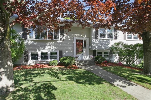 11 Marked Tree Road Needham, MA 02492 - Photo 1 of 9 front view of a house with a yard