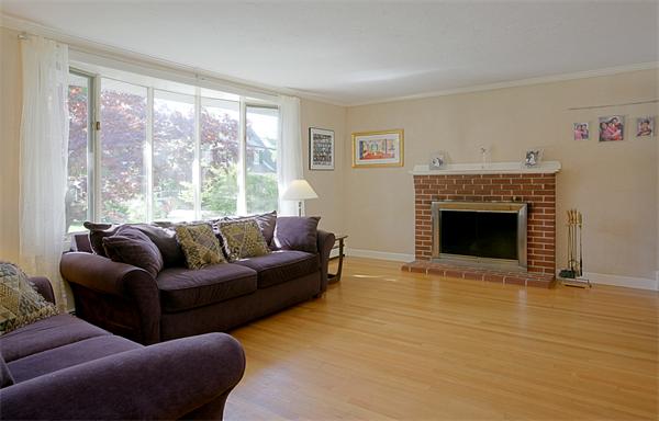 11 Marked Tree Road Needham, MA 02492 - Photo 3 of 9 a living room with furniture windows and a fireplace