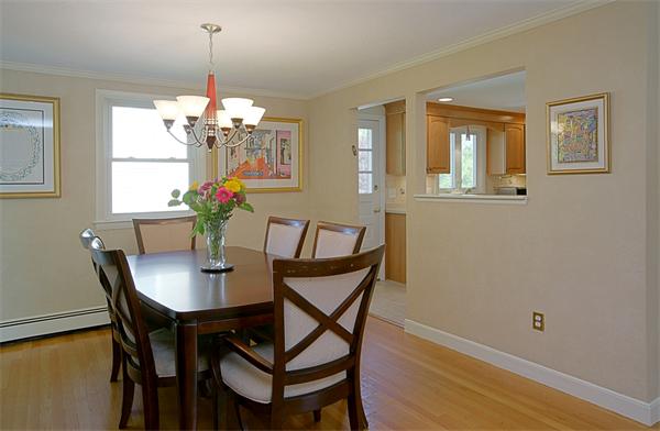11 Marked Tree Road Needham, MA 02492 - Photo 4 of 9 a dining room with furniture and chandelier