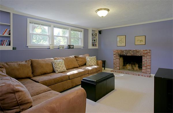 11 Marked Tree Road Needham, MA 02492 - Photo 7 of 9 a living room with furniture a window and a fireplace