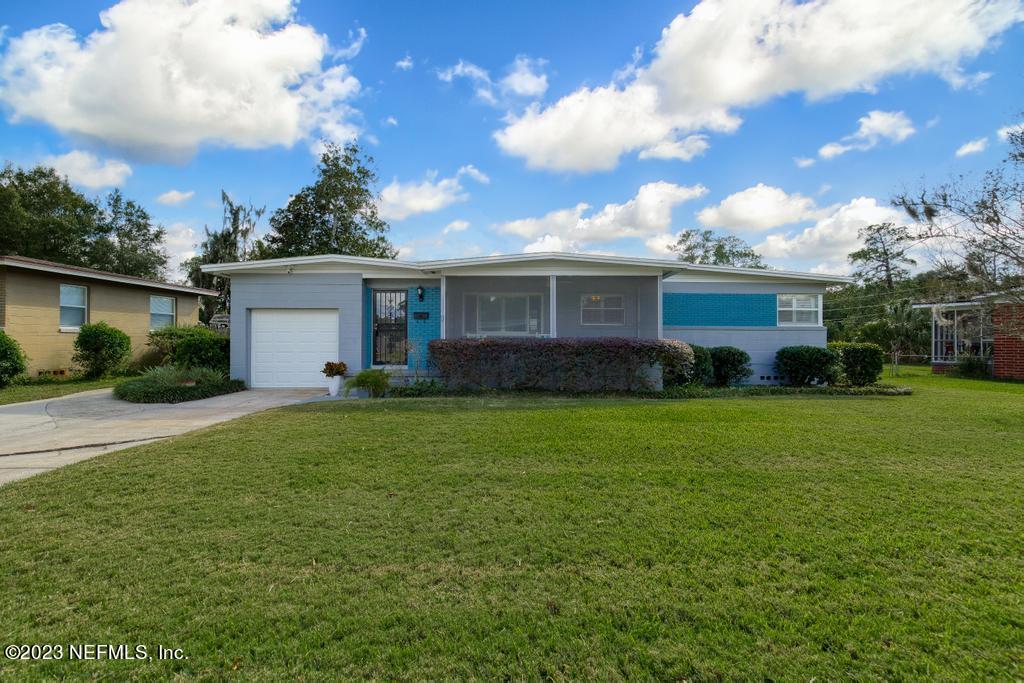 6712 E Road Jacksonville, FL 32216 - Photo 3 of 40 a house view with a garden space