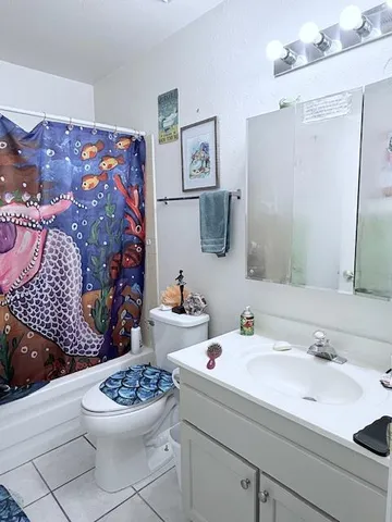 a kitchen that has a sink and cabinets