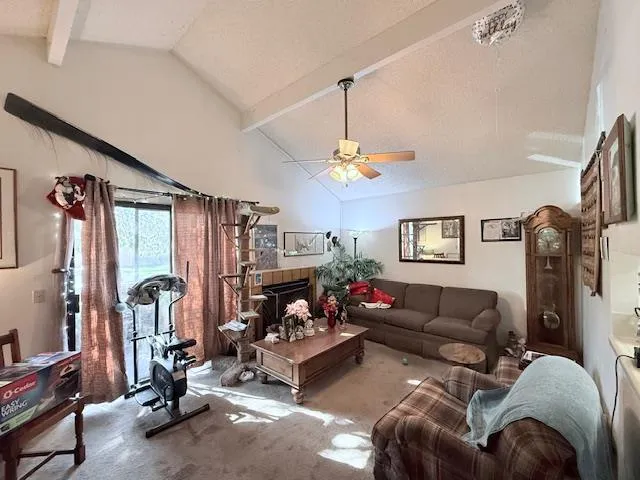 a kitchen with a stove a sink and cabinets