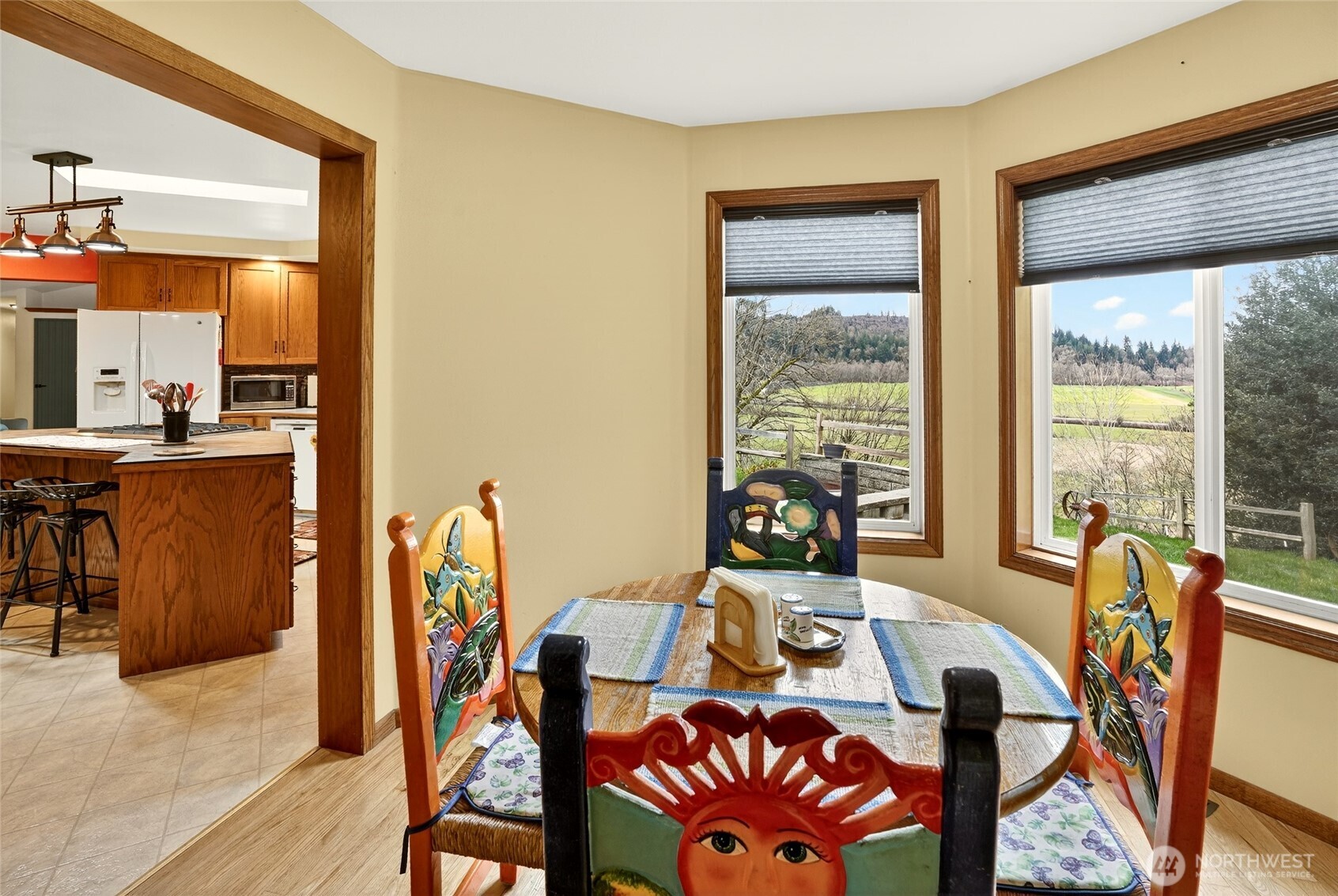 20070 Park Ridge Lane Sedro-Woolley, WA 98284 - Photo 22 of 40 a view of a dining room with furniture window and outside view