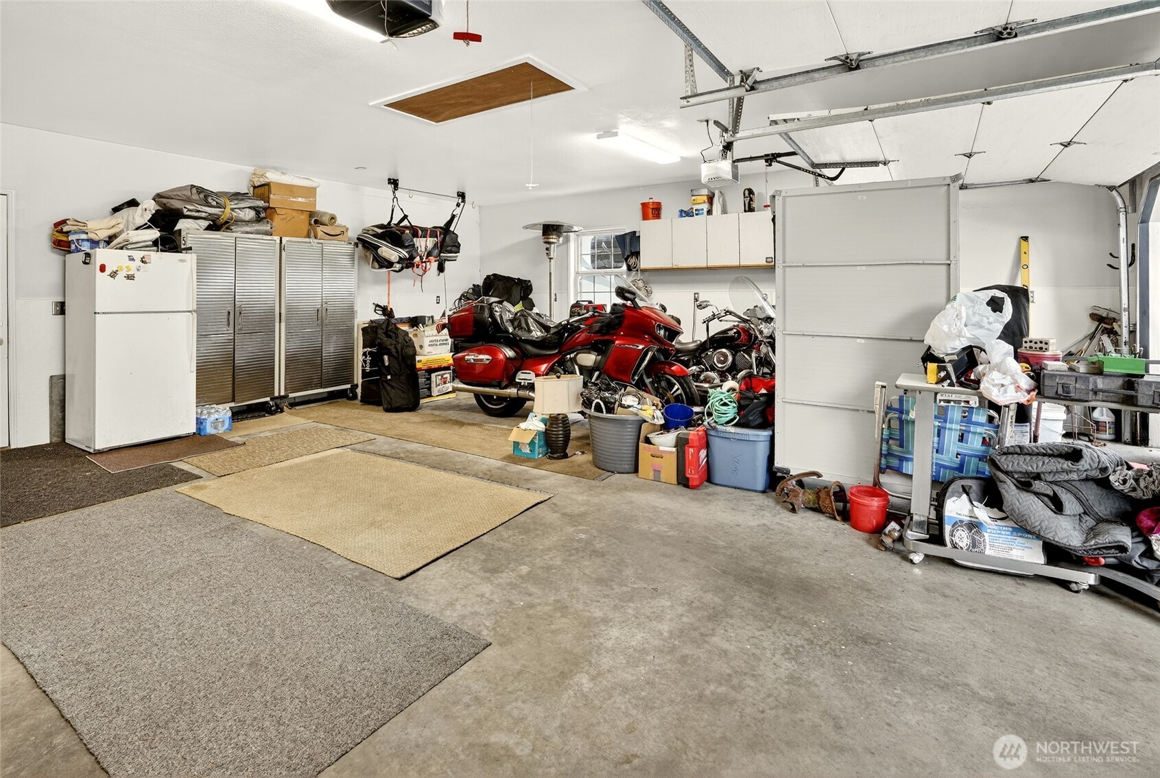 20070 Park Ridge Lane Sedro-Woolley, WA 98284 - Photo 25 of 40 a view of a garage with rack and bicycle