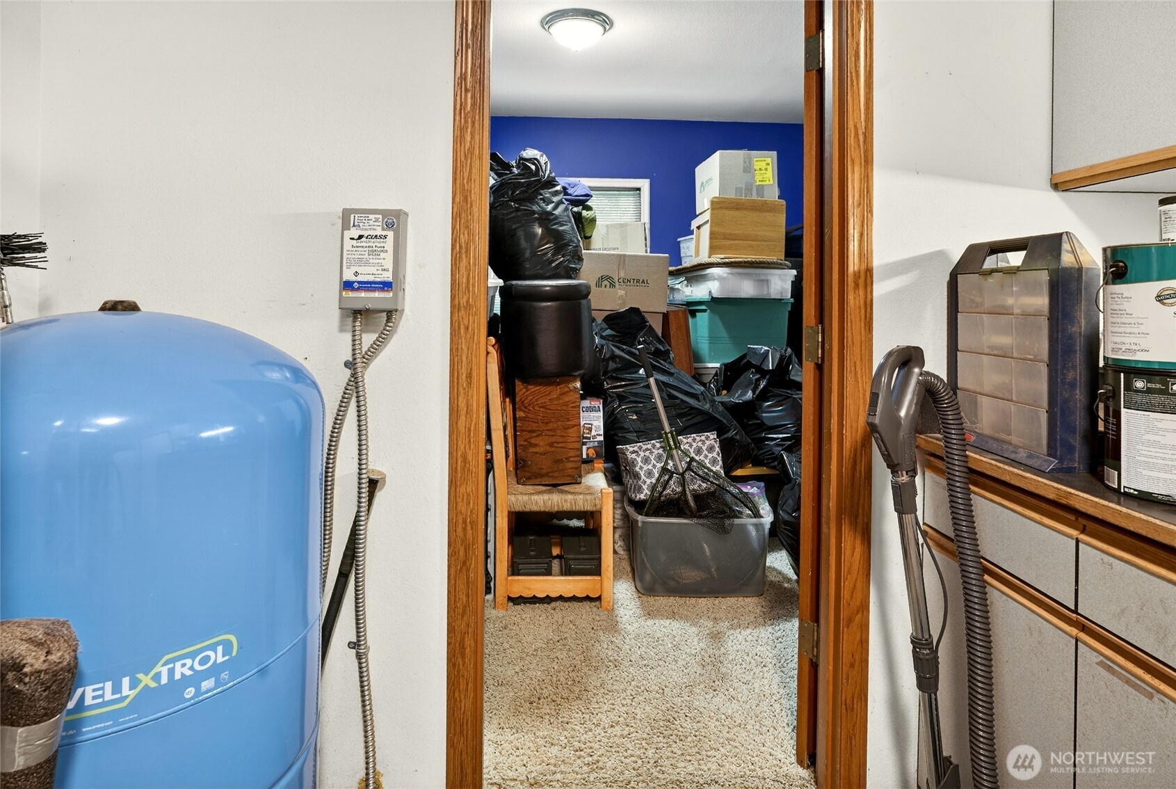 20070 Park Ridge Lane Sedro-Woolley, WA 98284 - Photo 27 of 40 a view of a living room with furniture and a floor to ceiling window