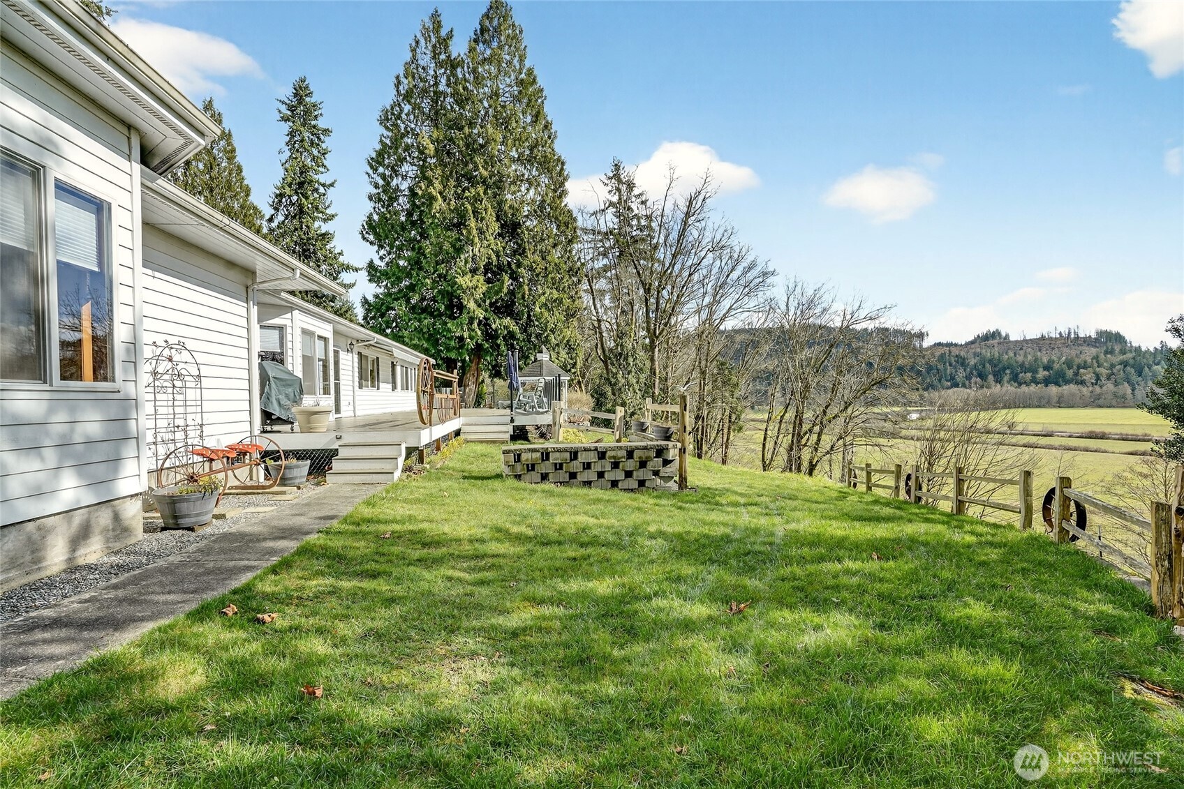 20070 Park Ridge Lane Sedro-Woolley, WA 98284 - Photo 33 of 40 a view of a house with backyard and sitting area
