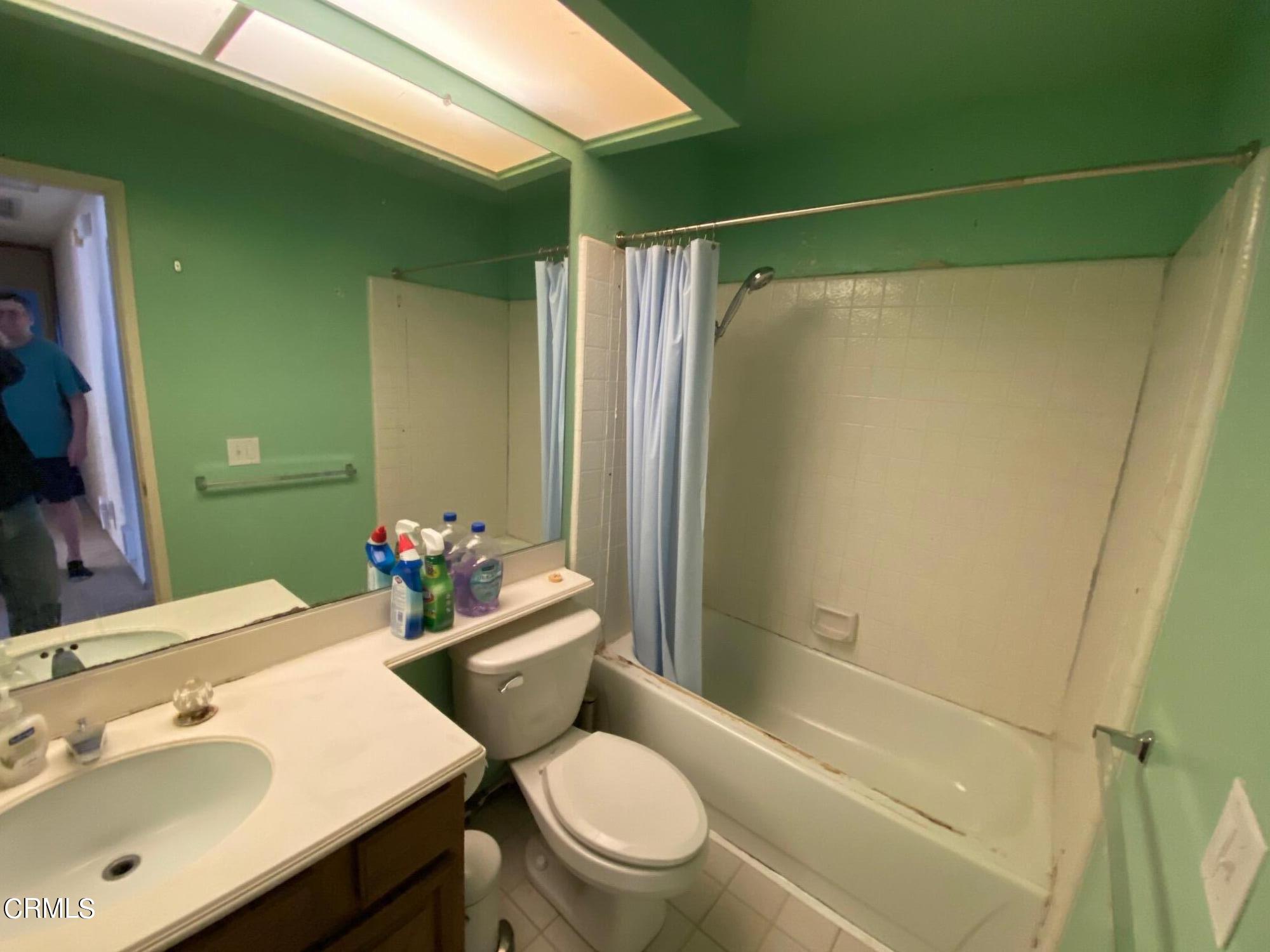 13657 Gunsmoke Road Moorpark, CA 93021 - Photo 16 of 26 a bathroom with a sink toilet and shower