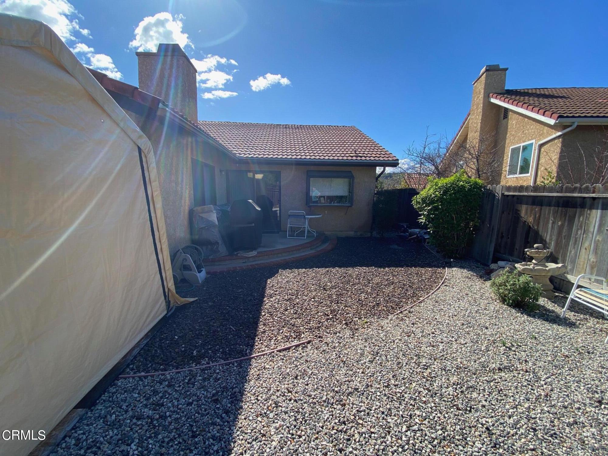 13657 Gunsmoke Road Moorpark, CA 93021 - Photo 20 of 26 a view of a house with a patio
