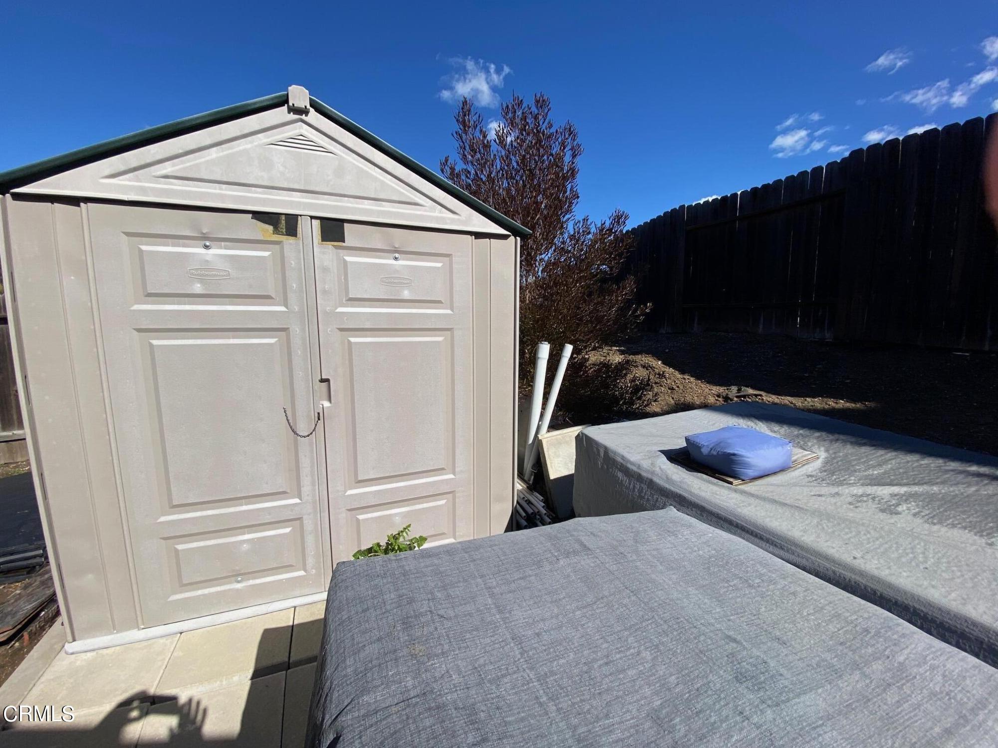13657 Gunsmoke Road Moorpark, CA 93021 - Photo 23 of 26 a house view with a backyard space
