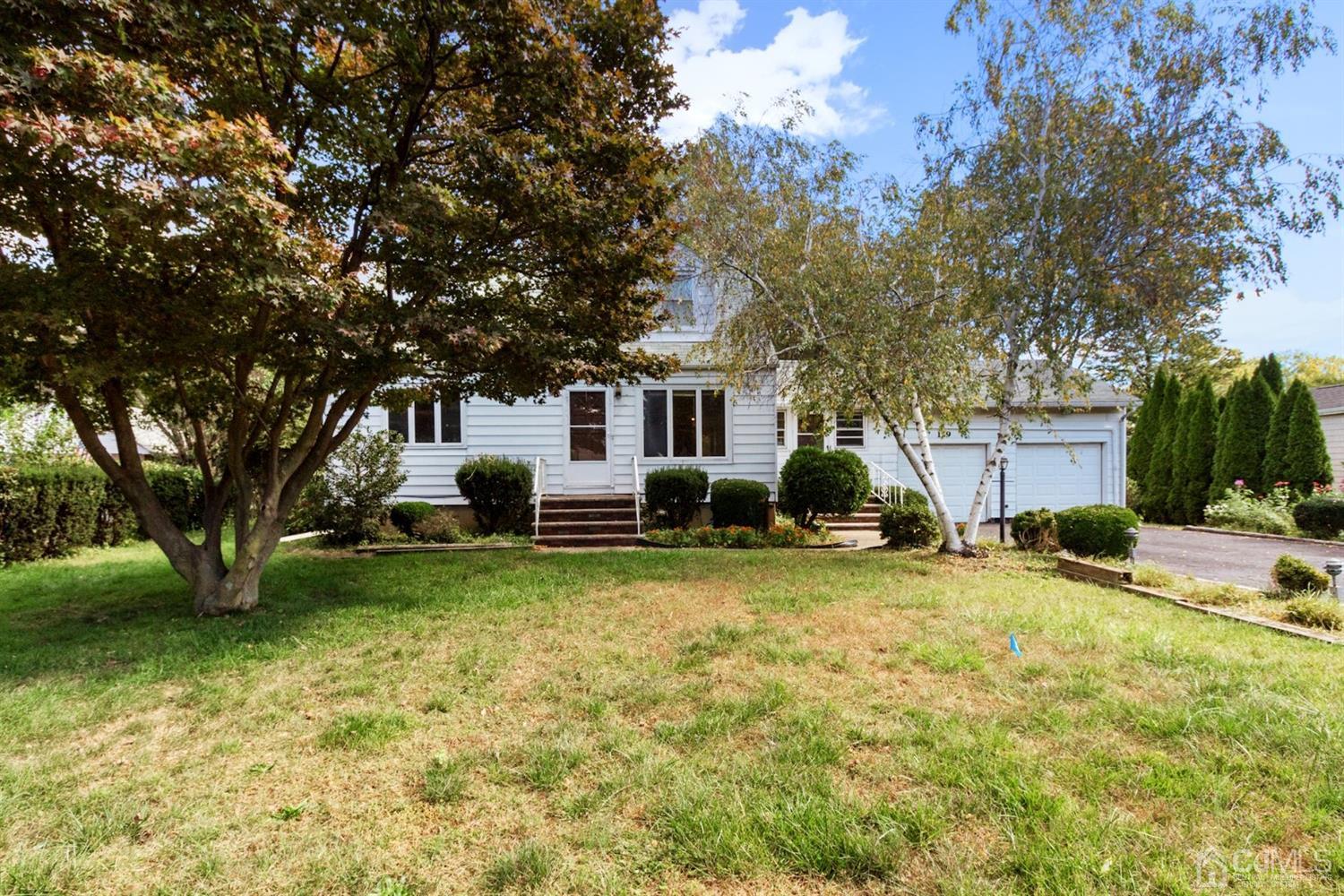 159 Vineyard Road Edison, NJ 08817 - Photo 1 of 30 a view of a house with backyard