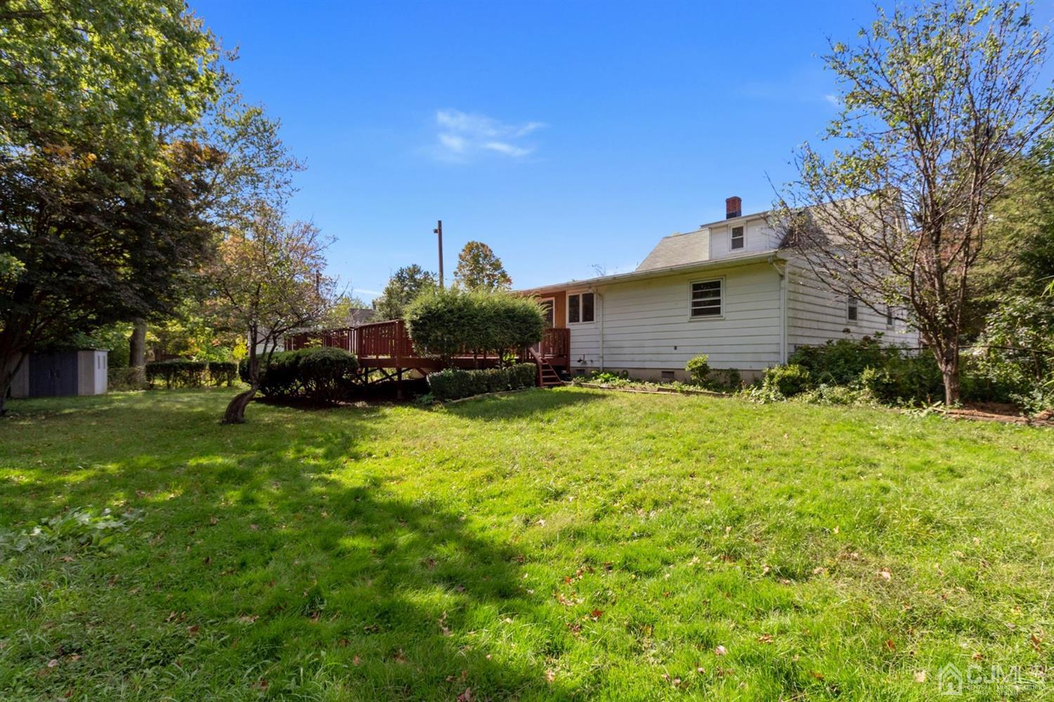 159 Vineyard Road Edison, NJ 08817 - Photo 29 of 30 a front view of a house with a yard