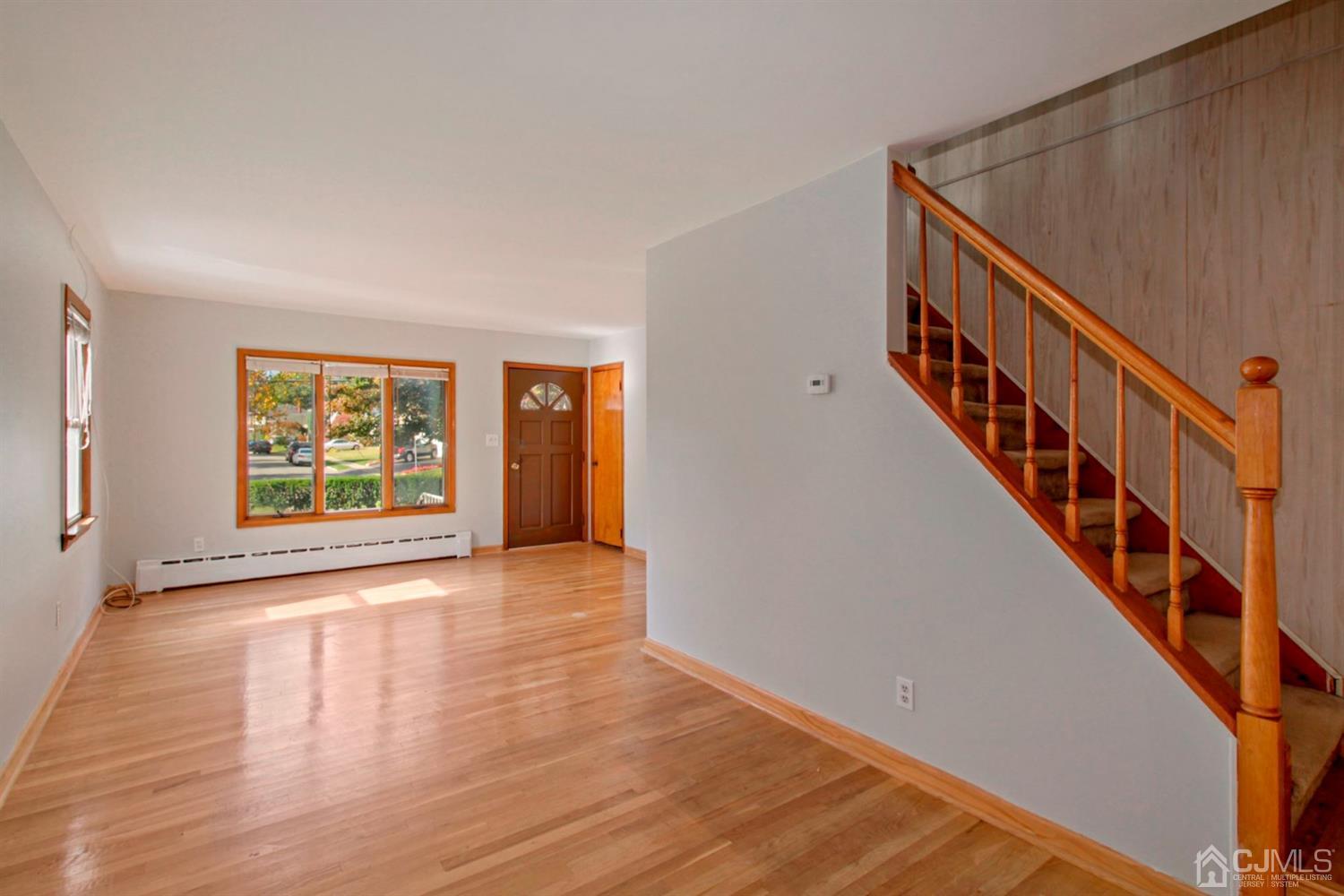 159 Vineyard Road Edison, NJ 08817 - Photo 4 of 30 a view of an entryway with wooden floor
