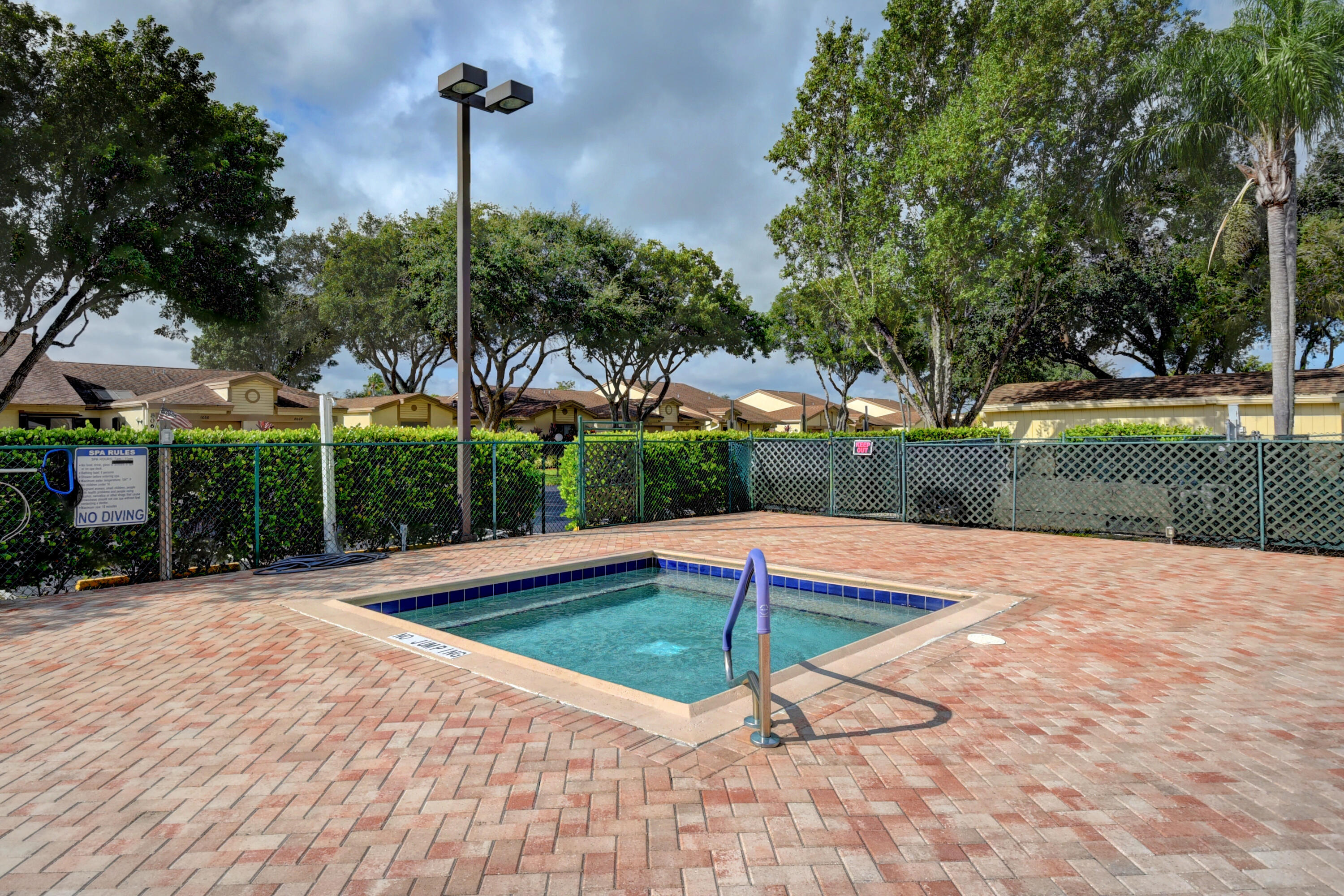 8246 Springview Terrace Boca Raton, FL 33496 - Photo 48 of 53 a swimming pool with yard outdoor seating and yard