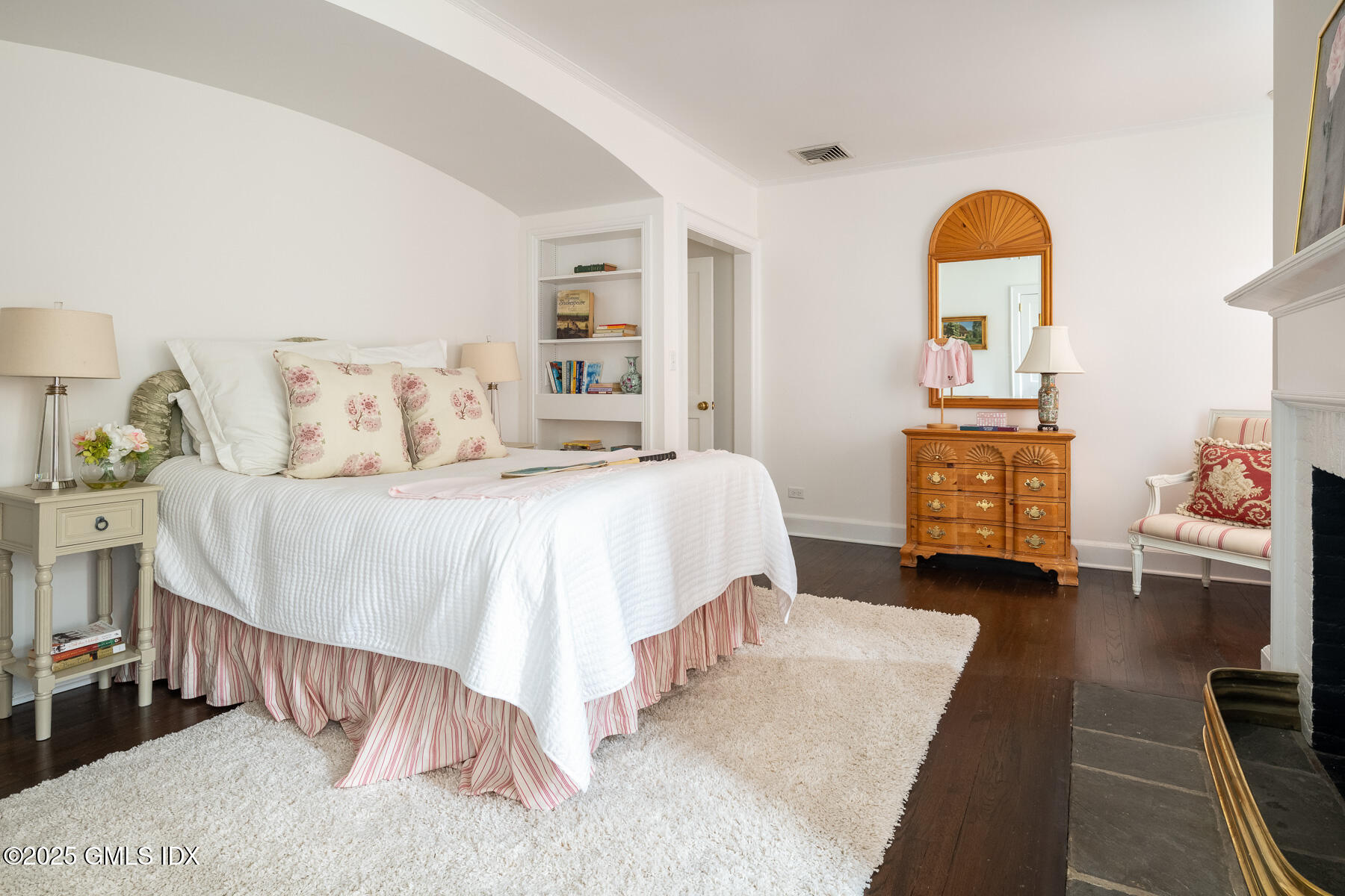 78 Khakum Wood Road Greenwich, CT 06831 - Photo 13 of 27 a bedroom with a bed and wooden floor