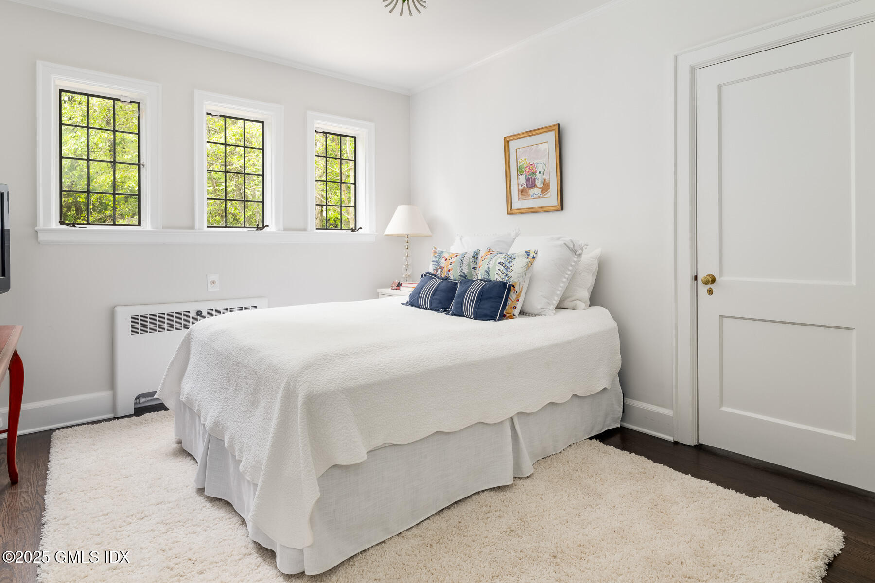 78 Khakum Wood Road Greenwich, CT 06831 - Photo 14 of 27 a bedroom with a bed and a window