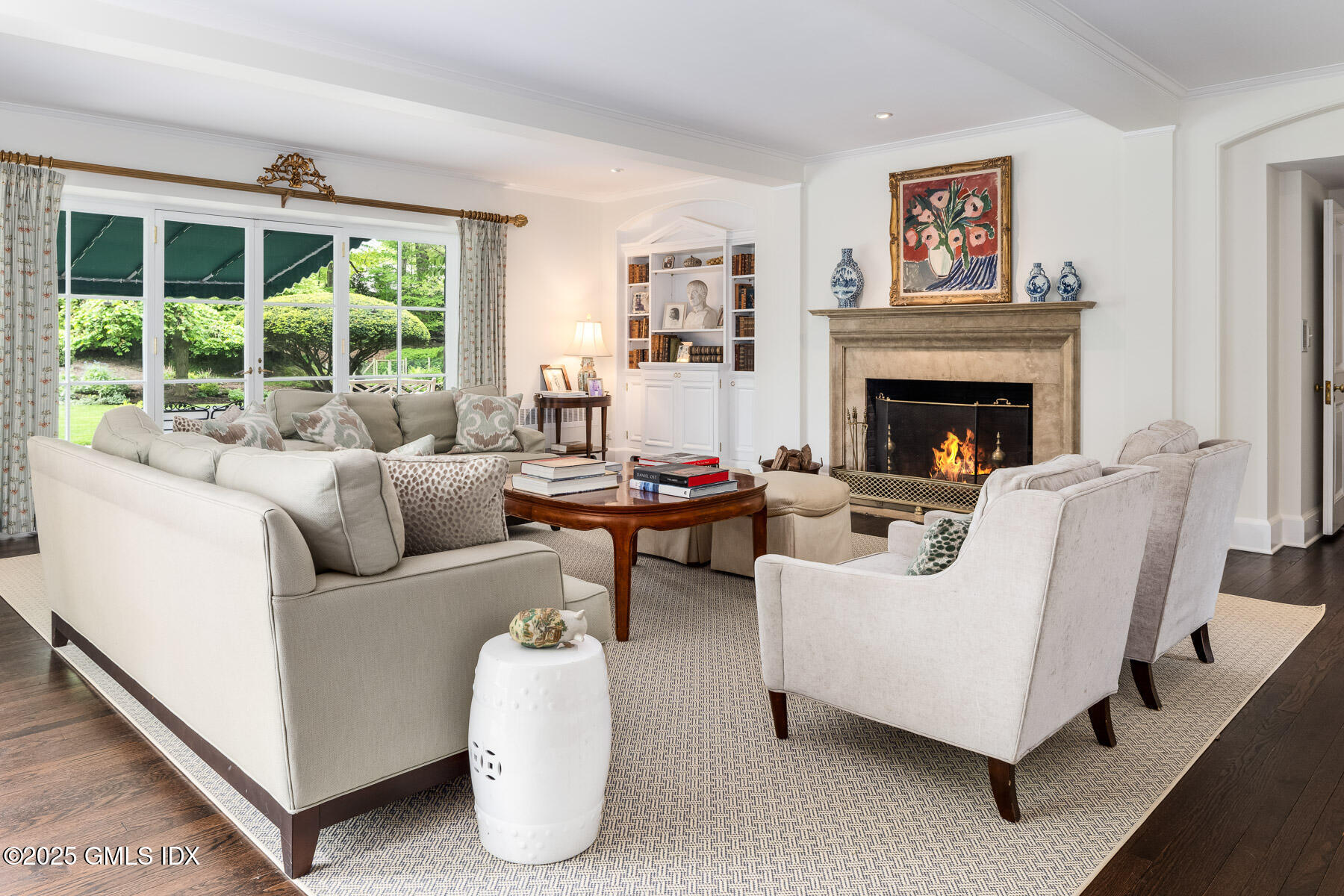 78 Khakum Wood Road Greenwich, CT 06831 - Photo 3 of 27 a living room with furniture and a fireplace