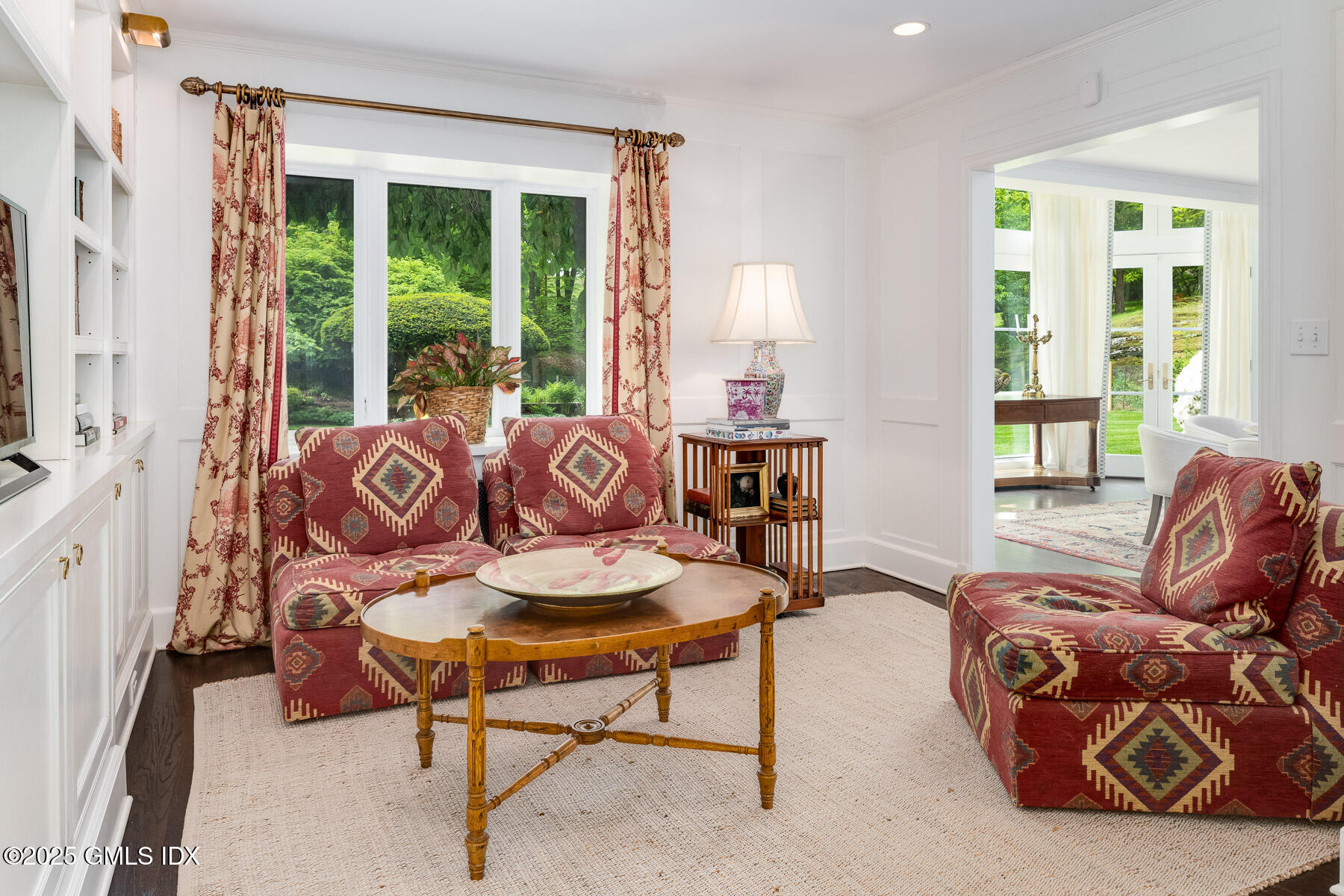 78 Khakum Wood Road Greenwich, CT 06831 - Photo 5 of 27 a living room with furniture and a large window