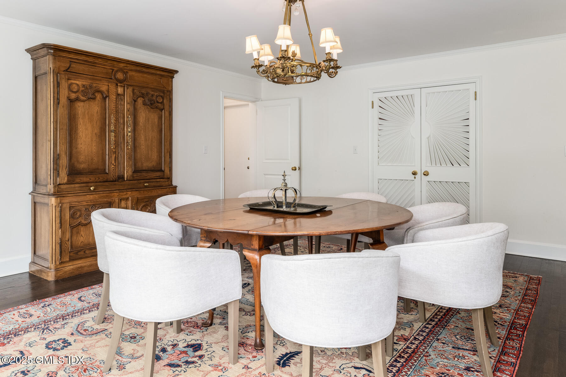 78 Khakum Wood Road Greenwich, CT 06831 - Photo 7 of 27 a dining room with table and chairs