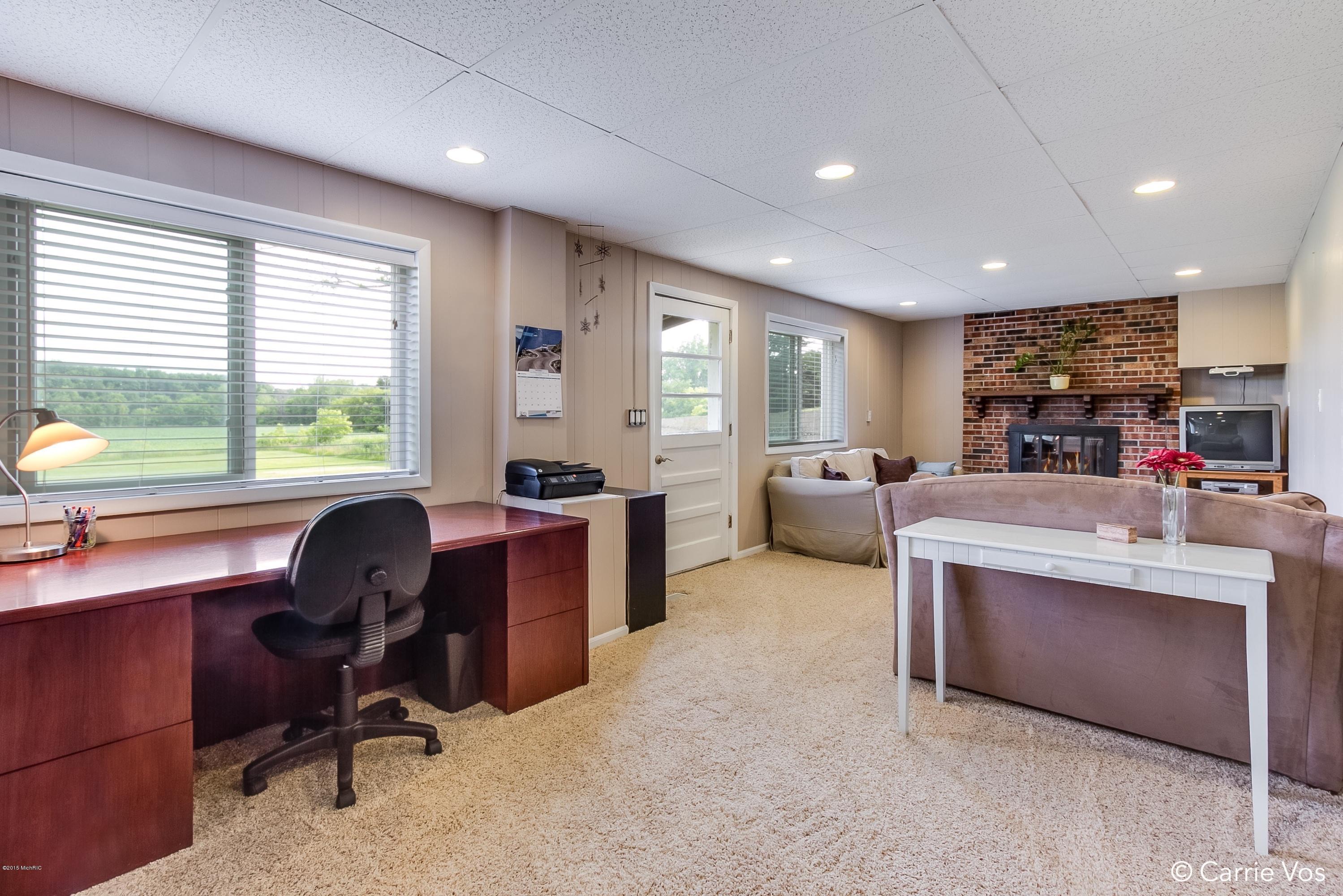 8750 16 Mile Road Northeast Cedar Springs, MI 49319 - Photo 18 of 27 020_Basement Living Room