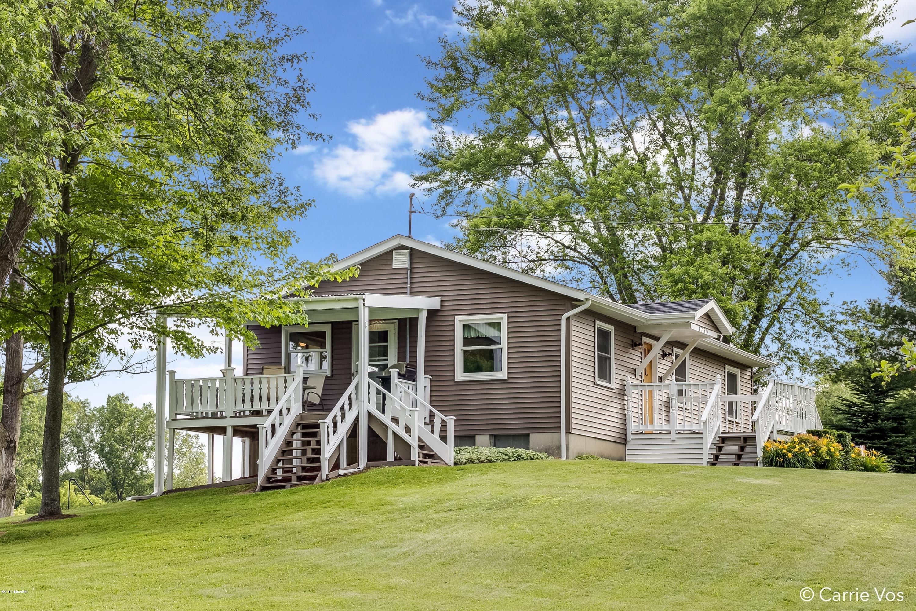 8750 16 Mile Road Northeast Cedar Springs, MI 49319 - Photo 2 of 27 001_8750 16 Mile Road