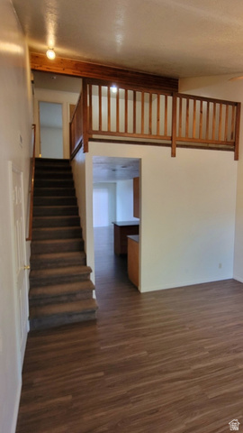 190 West 700 North Logan, UT 84321 - Photo 48 of 51 Stairs featuring wood finished floors and baseboards