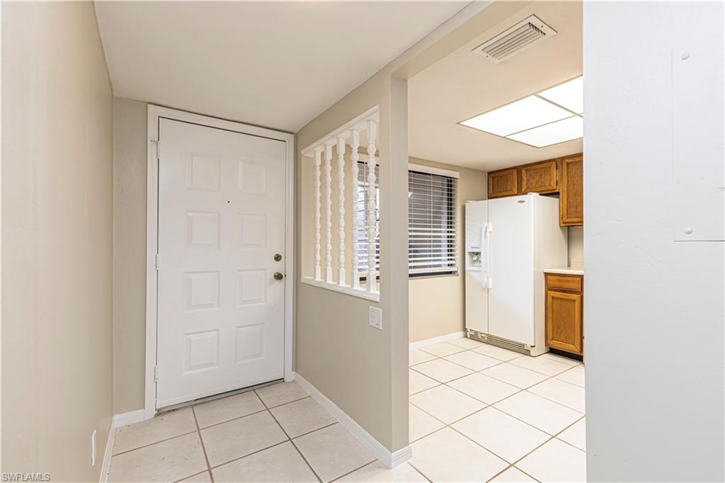 5825 Rattlesnake Hammock Road, Unit 108 Naples, FL 34113 - Photo 6 of 21 Foyer