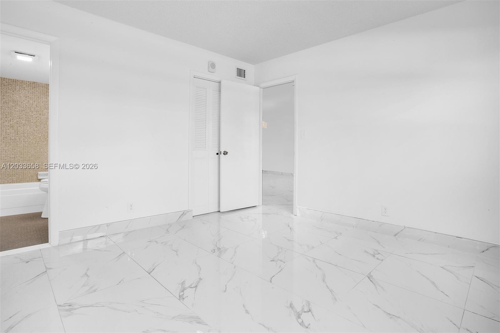 8852 West McNab Road, Unit 205 Tamarac, FL 33321 - Photo 16 of 41 Master Bedroom