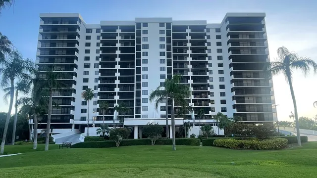 a view of a building with sitting area