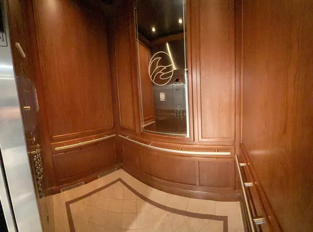 a view of a house with potted plants