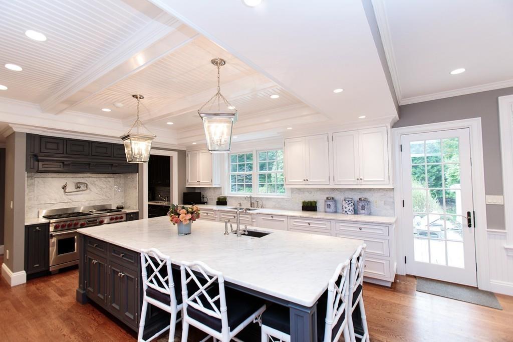 71 Hundreds Road Wellesley, MA 02481 - Photo 14 of 31 a large kitchen with stainless steel appliances a stove a sink dishwasher and a refrigerator