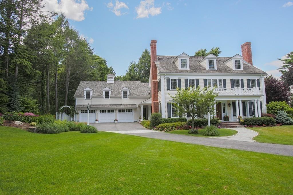 71 Hundreds Road Wellesley, MA 02481 - Photo 2 of 31 a aerial view of a house with swimming pool and garden