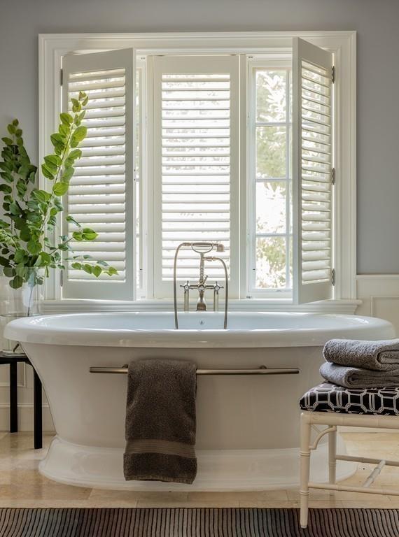 71 Hundreds Road Wellesley, MA 02481 - Photo 23 of 31 a bathroom sink with a bathtub and next to a window