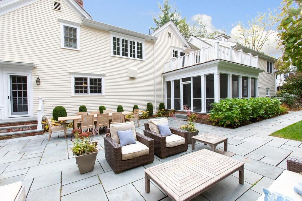 71 Hundreds Road Wellesley, MA 02481 - Photo 30 of 31 a view of a patio with couches table and chairs and potted plants