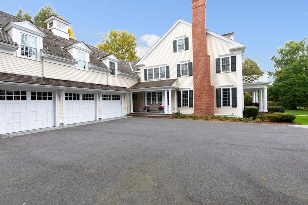 71 Hundreds Road Wellesley, MA 02481 - Photo 4 of 31 a view of a large building with a street
